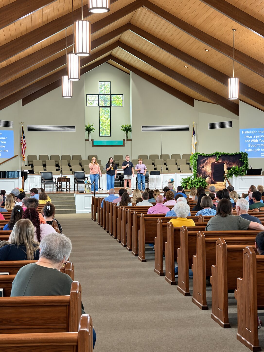 Young people leading praise during worship